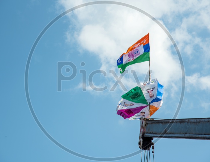 Local Political Party Flags Tagged to a Crane At Dahi Handi Festival Celebrations