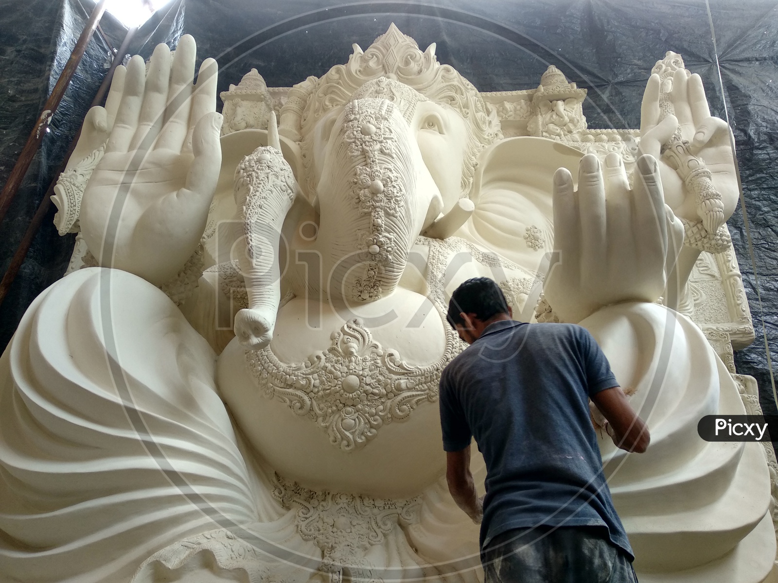 Prepartion of Ganesh Idol for Ganesh Chathurthi. Final Finishing of Idol and ready to paint