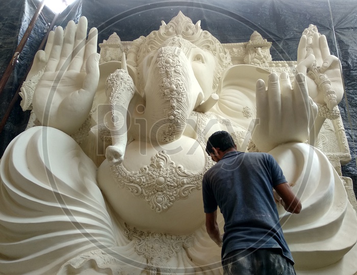 Prepartion of Ganesh Idol for Ganesh Chathurthi. Final Finishing of Idol and ready to paint