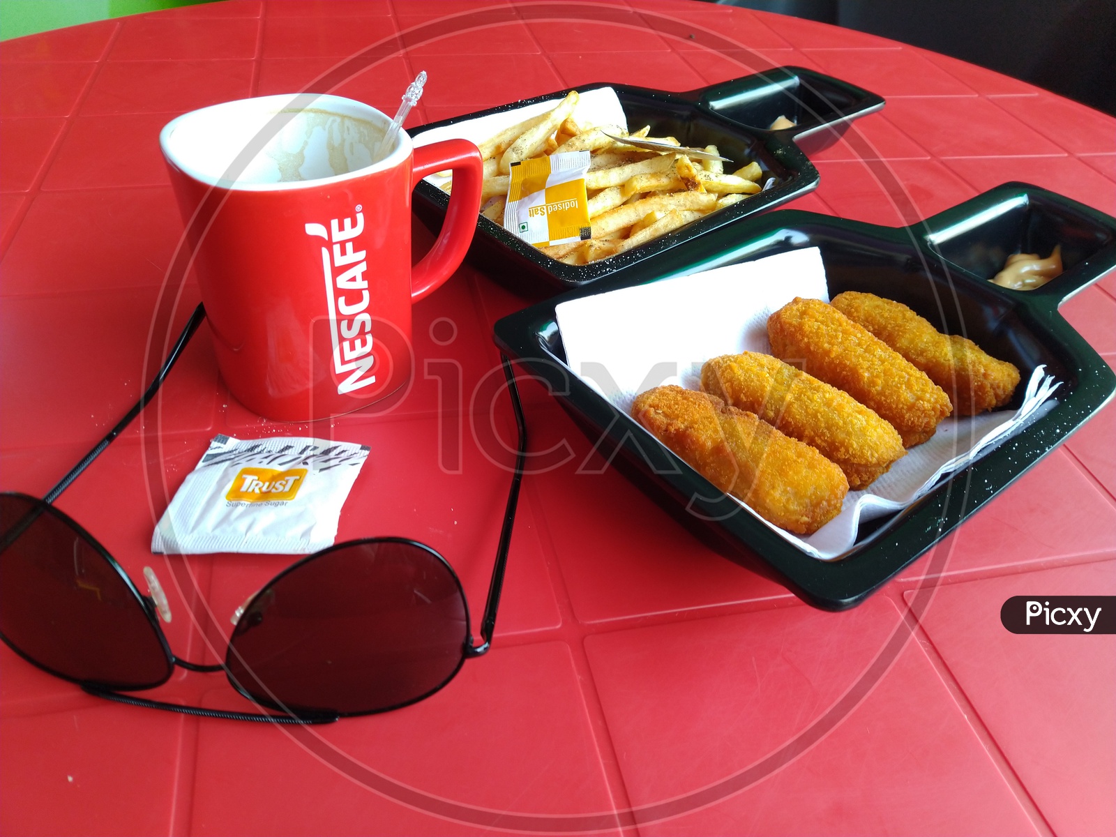 Snacks And Coffee Cup On an Table