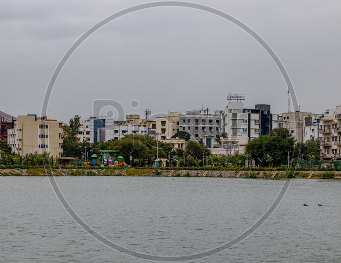 A View Of High Rise Apartments or Buildings From Durgam Cheruvu