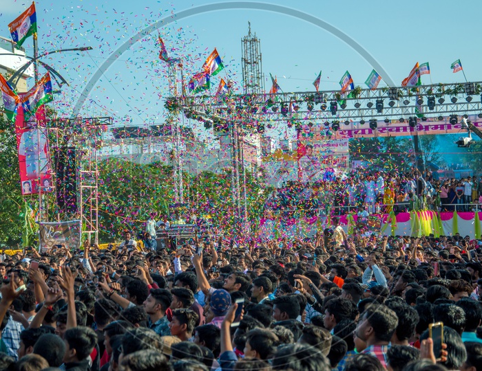 Crowd Of Young Indian People Enjoying And Dancing  Govinda  At The Dahi Handi Festival  To Celebrate Lord  Krishna's Birth Aniversary  Gokul Ashtami Or Krishna Ashtami