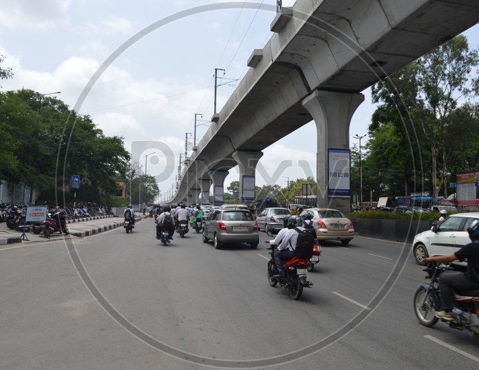 Hyderabad Metro Pillars and Traffic on Road