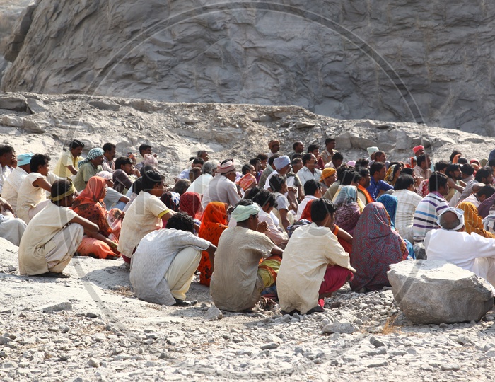Crowd Gathering In a Stone Quarry