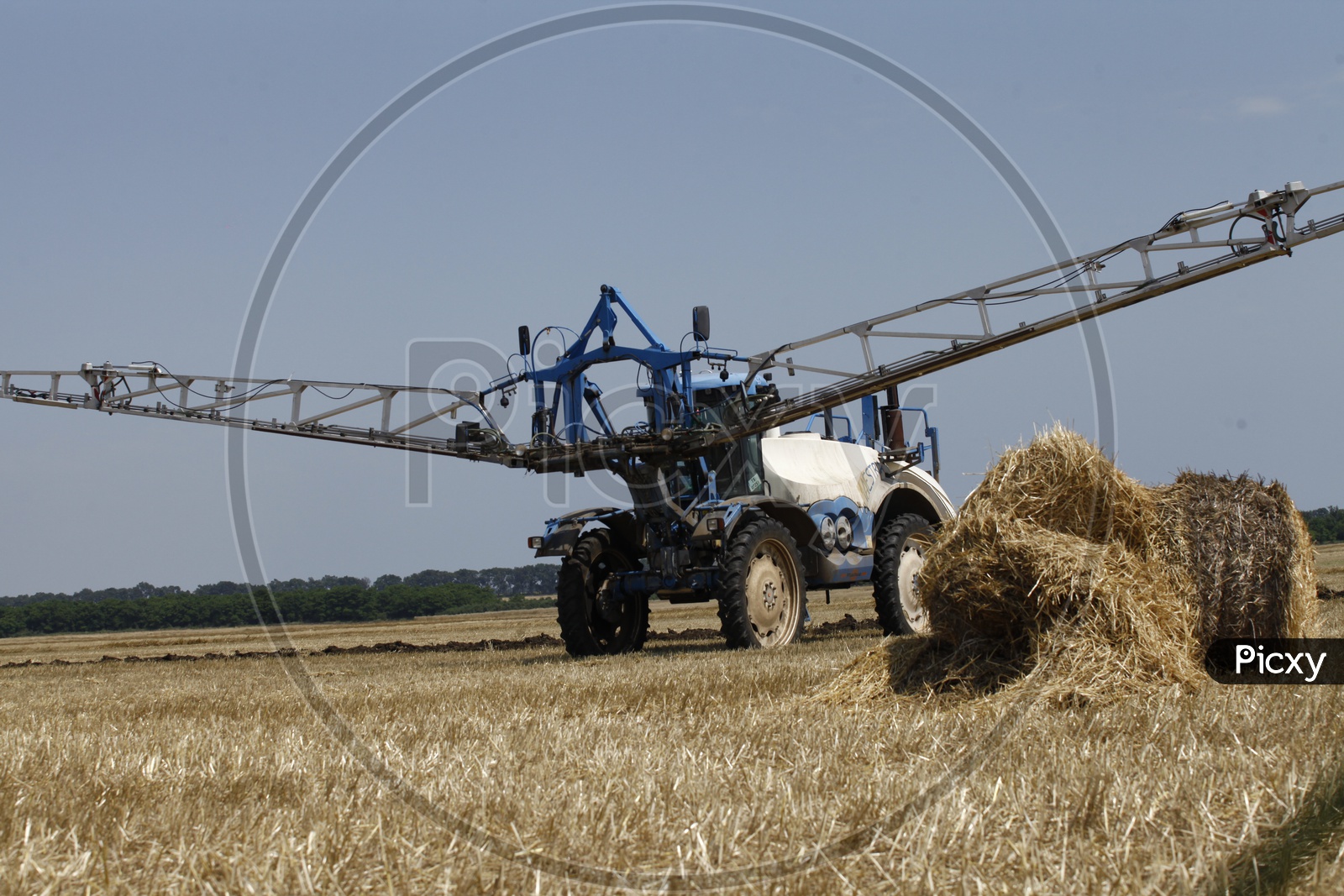 Paddy Harvesting Machines in Agricultural Fields