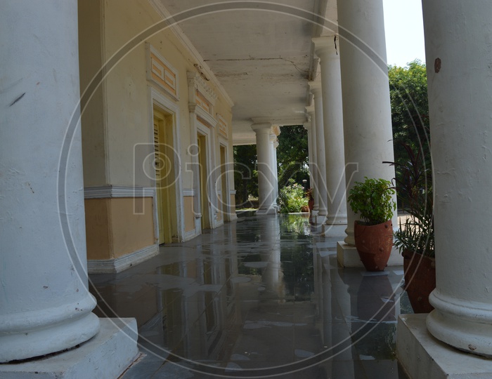 Corridor Of a House With Pillars