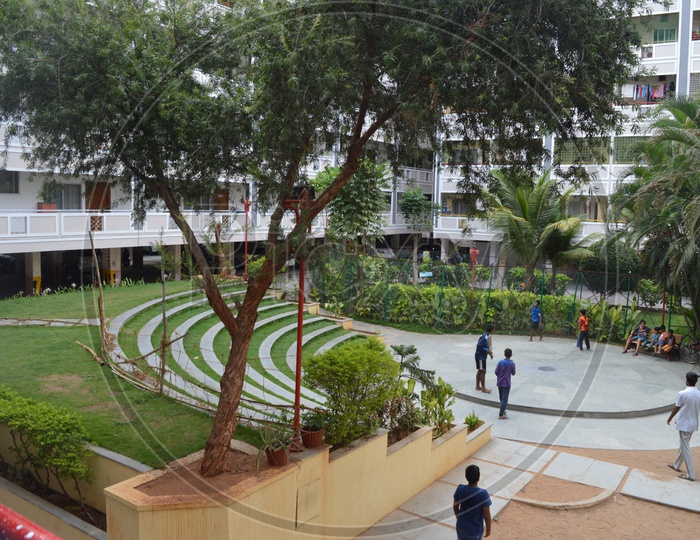 Children Playing in Amusement Area At Residential Flats Apartments