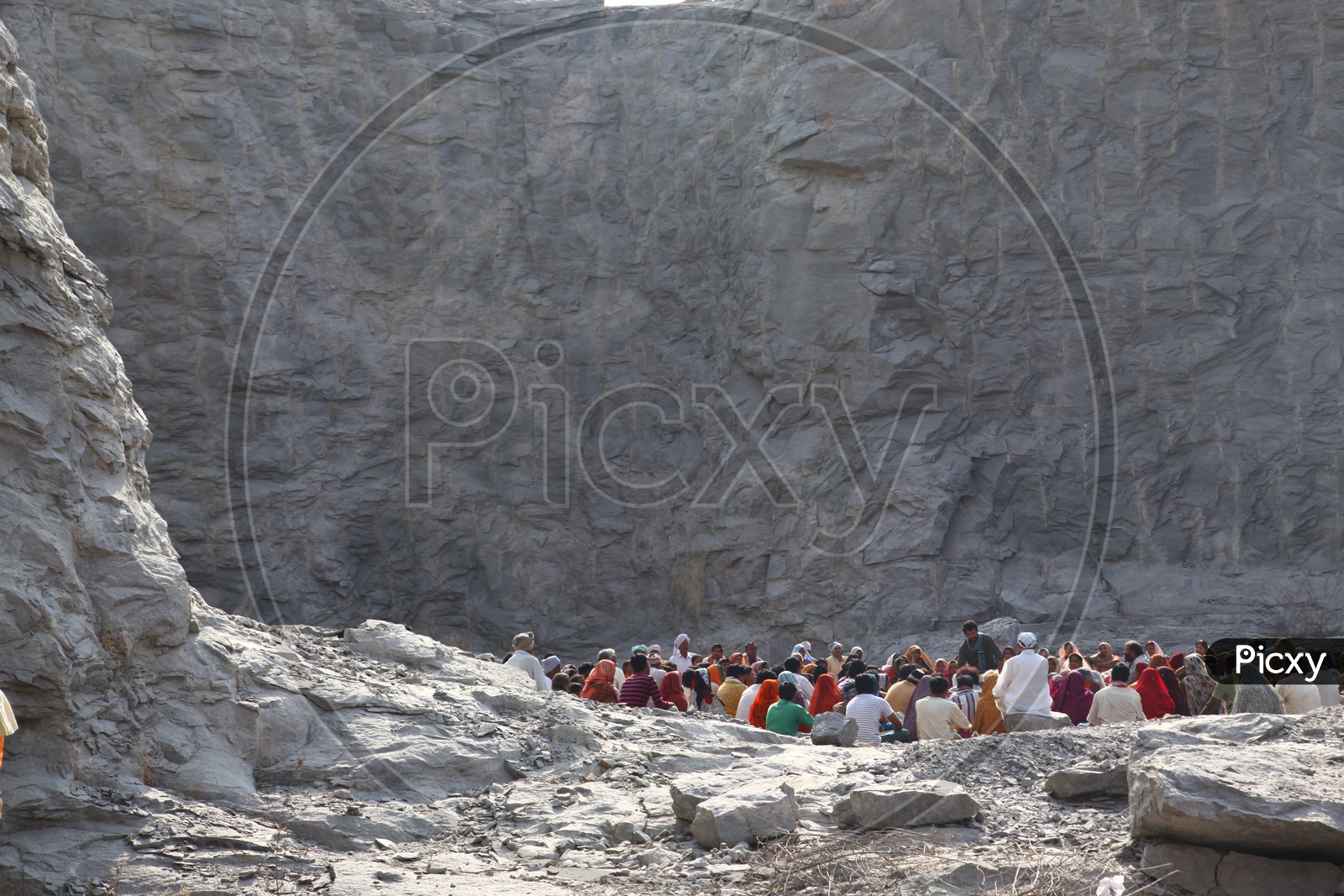 Crowd Gathering In a Stone Quarry
