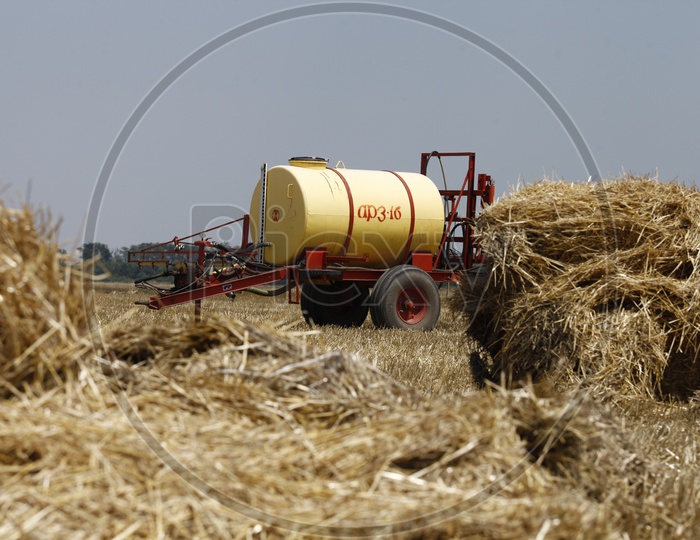 Paddy Harvesting machines in Agricultural Fields