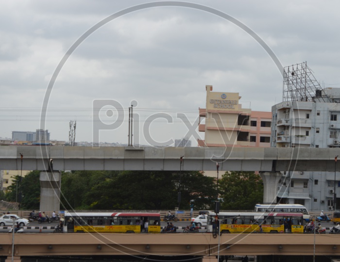 Hyderabad Metro Pillars and Traffic on Bridge