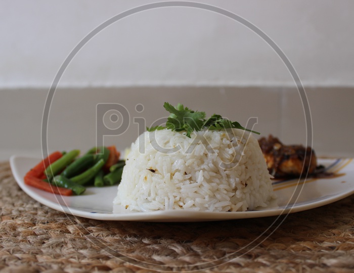 Rice dome garnished with coriander