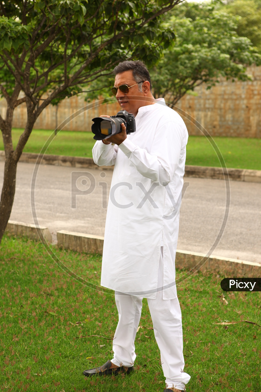 Actor Boman Irani with DSLR Camera