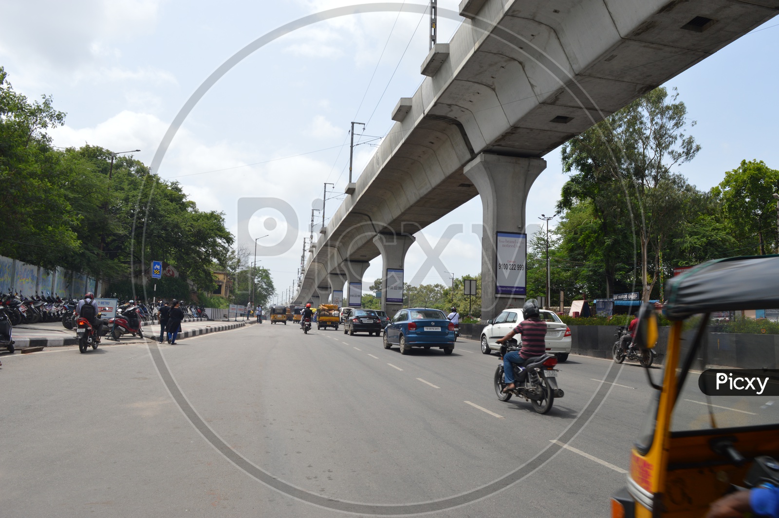 Hyderabad Metro Pillars and Traffic on Road