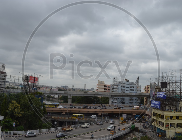 Hyderabad Metro Pillars and Traffic on Bridge
