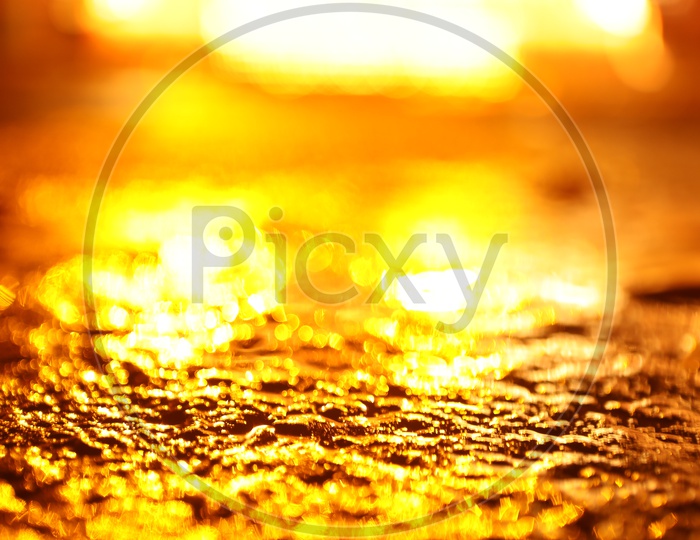 Luminous Golden Yellow Light Over A Surface