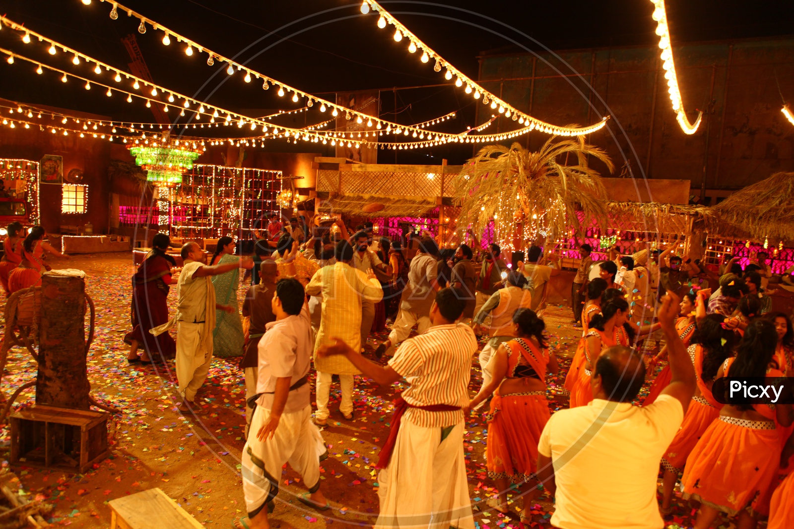 Villagers Dancing In Happiness in a Public Event