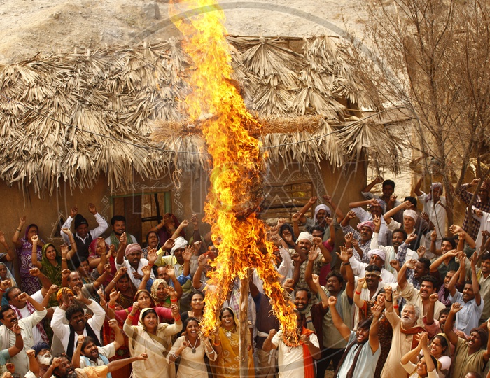 Villagers Celebrating By Burning Scare Crow