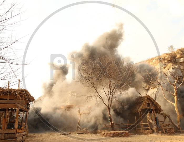 Fire Mishap in a Village With Huts Catching Fire And Thick Dark Smoke