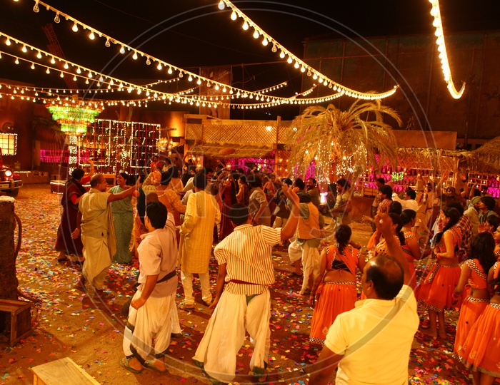 Villagers Dancing In Happiness in a Public Event