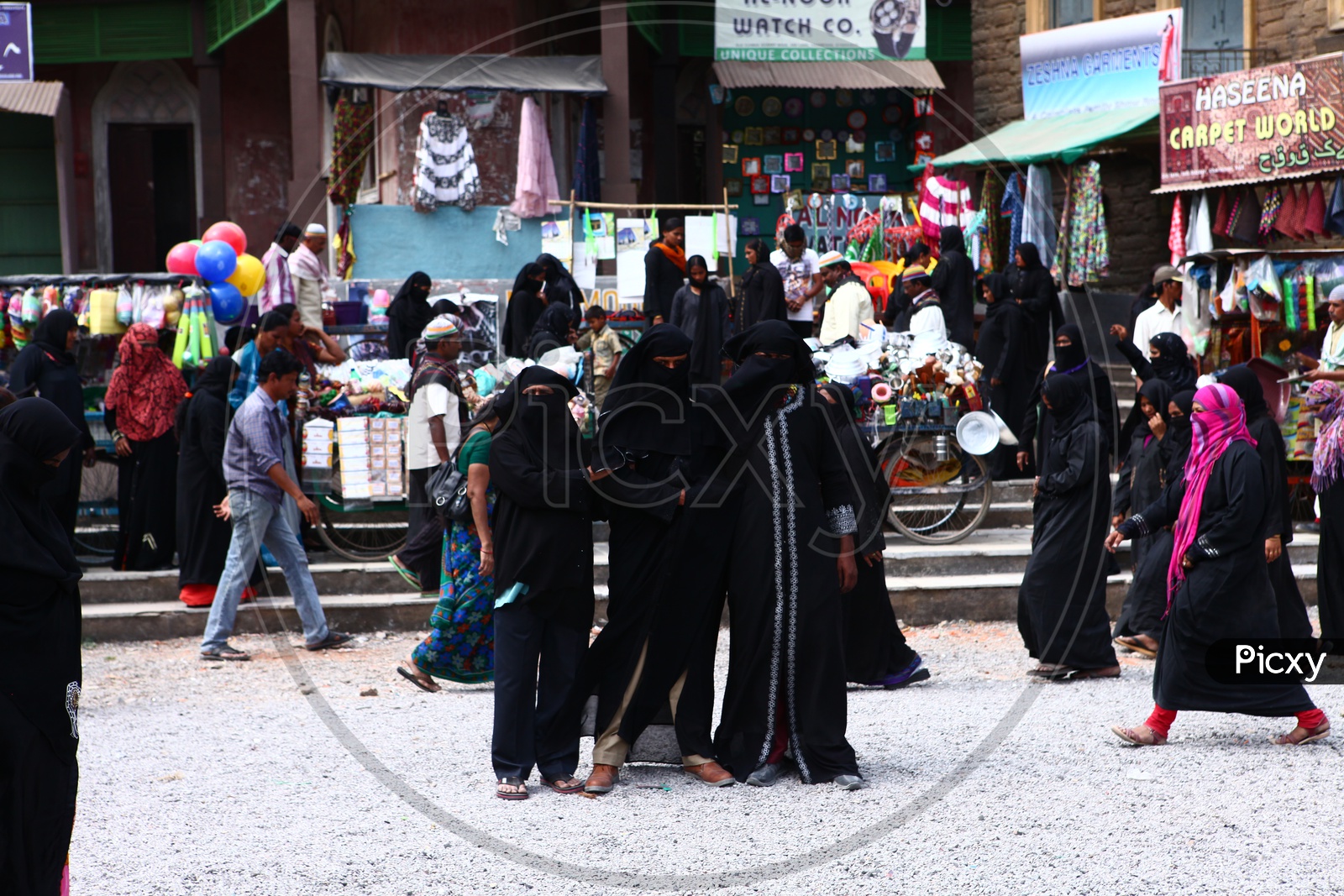 Muslim Woman In Vendor Street