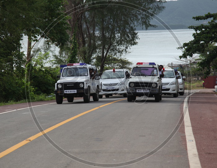 Police Vehicles Jeeps Convoy on Roads