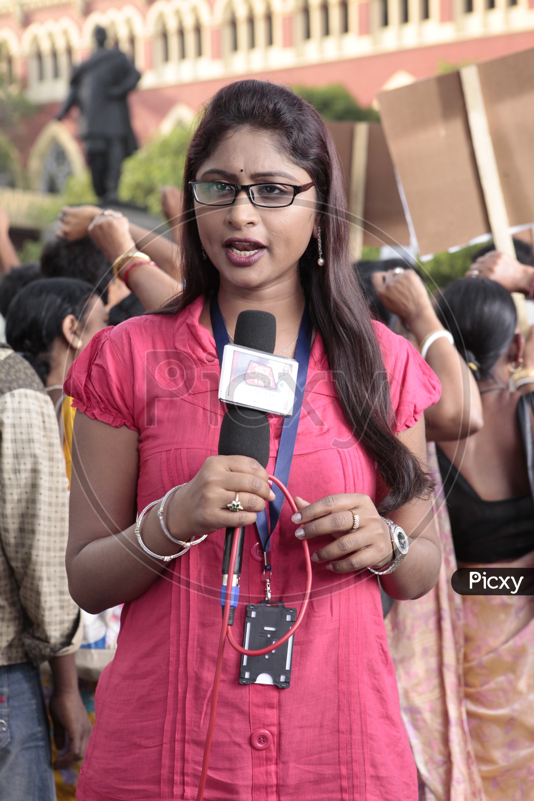 TV Reporters Or News Coverage Media Or Lady Reporters Reporting  At a Protest or Riots
