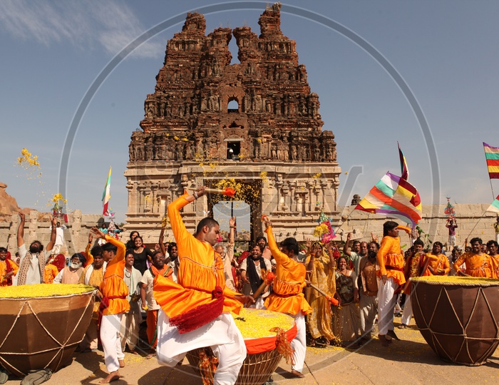 People Celebrating Local Festival In an Ancient Temple By Dancing Cheerfully
