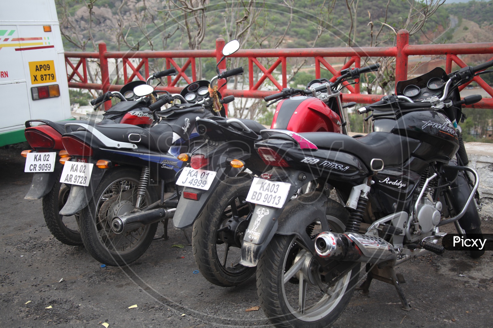 Bikes Parked In a Parking Place