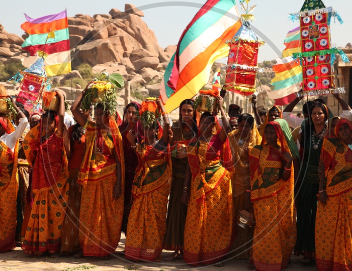 Villagers Celebrating Local Festivals By Holding Flags