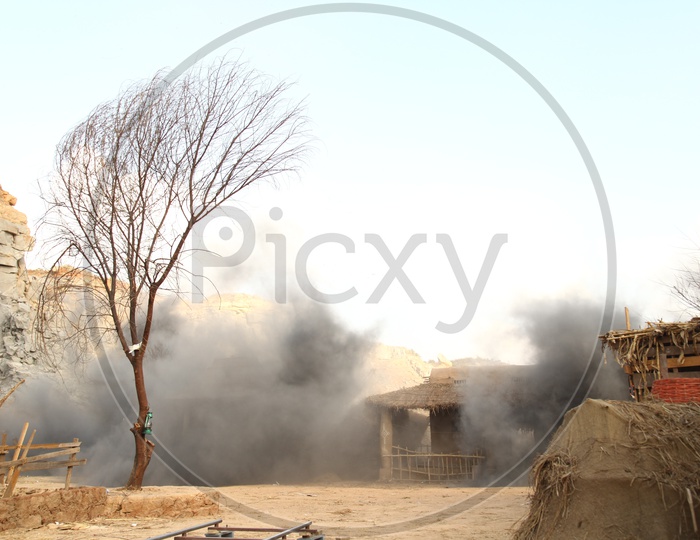 Fire Accident mishap bomb blast in a Rural Village With Huts In Air