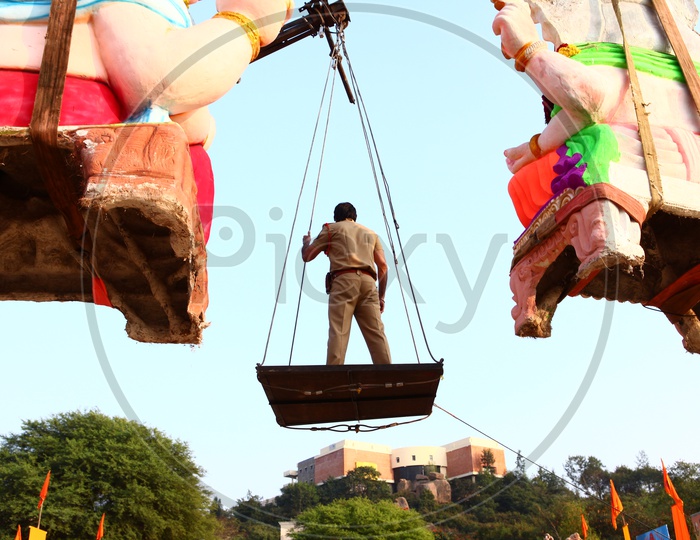 Ganesh Immersion With Heavy Cranes