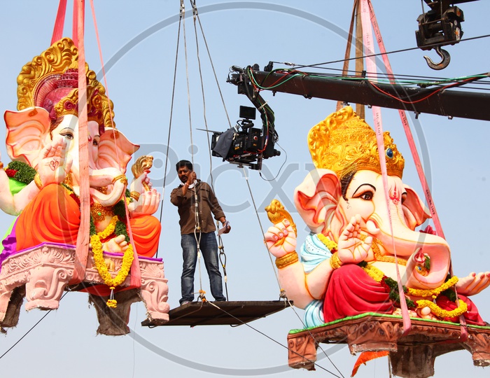 Ganesh Idols Immersion or Nimarjan With Cranes for Ganesh Festival
