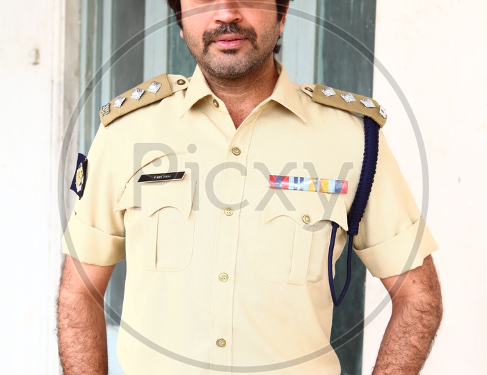 Indian Young Man In Police Uniform