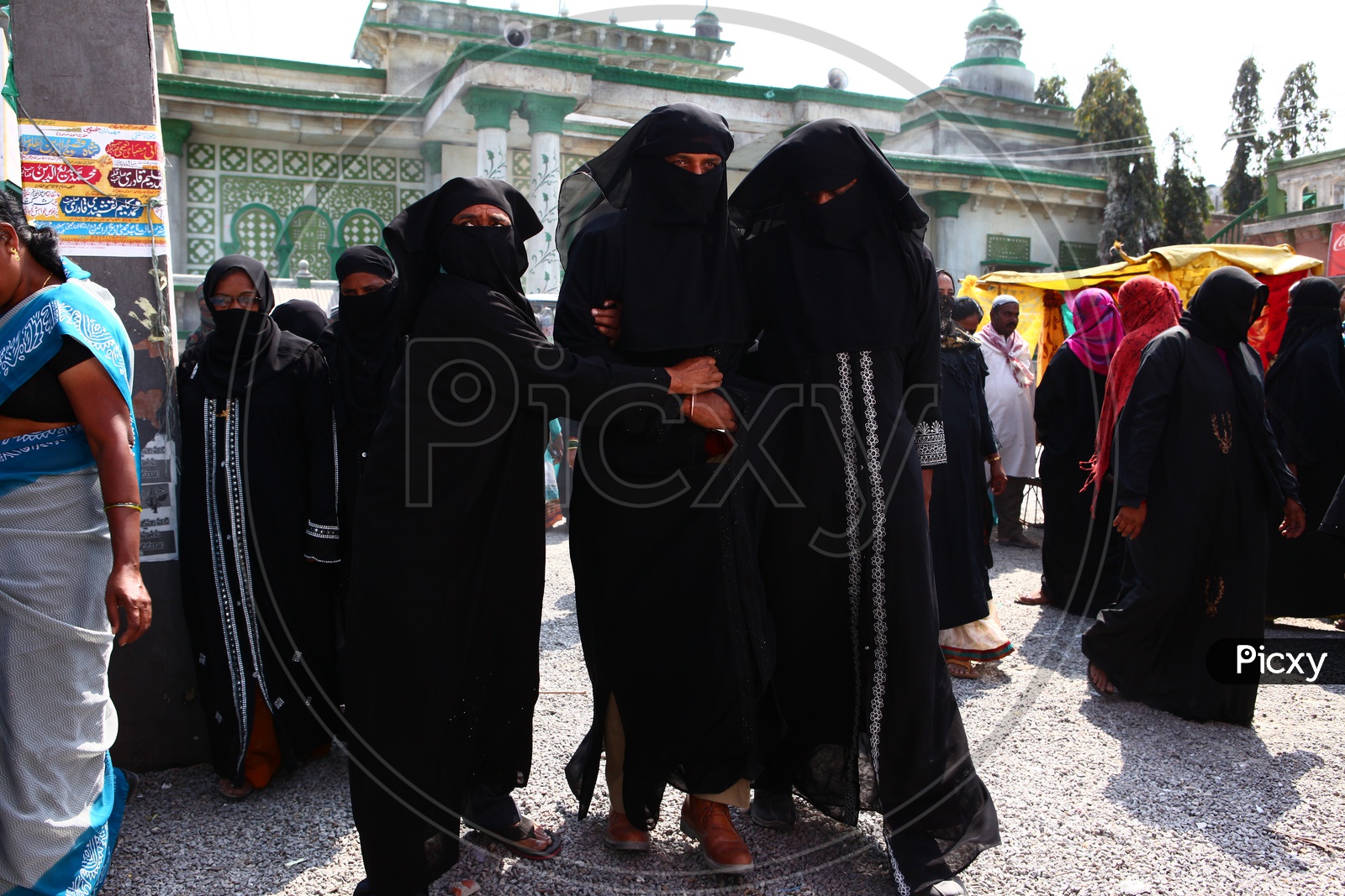 Muslim Woman In Vendor Street