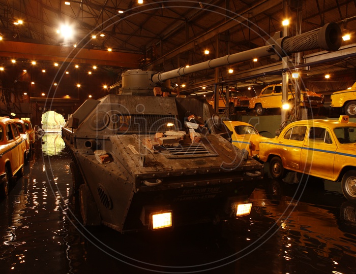 Yellow Cabs And Military Tanker for a Movie Shooting