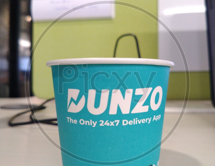 Dunzo App Promotion on a Paper Cup