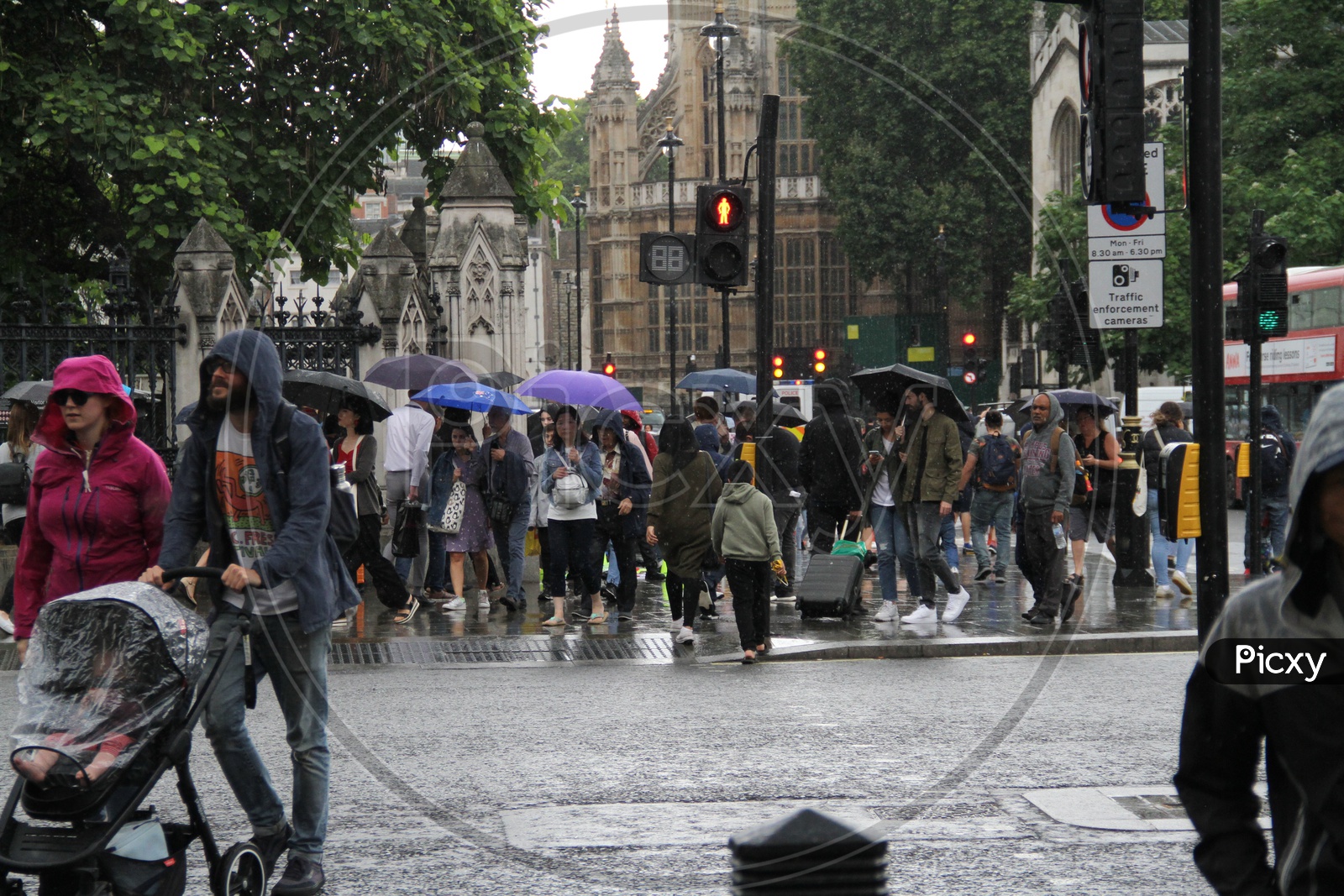 People walking on Footpath on a Rainy Day