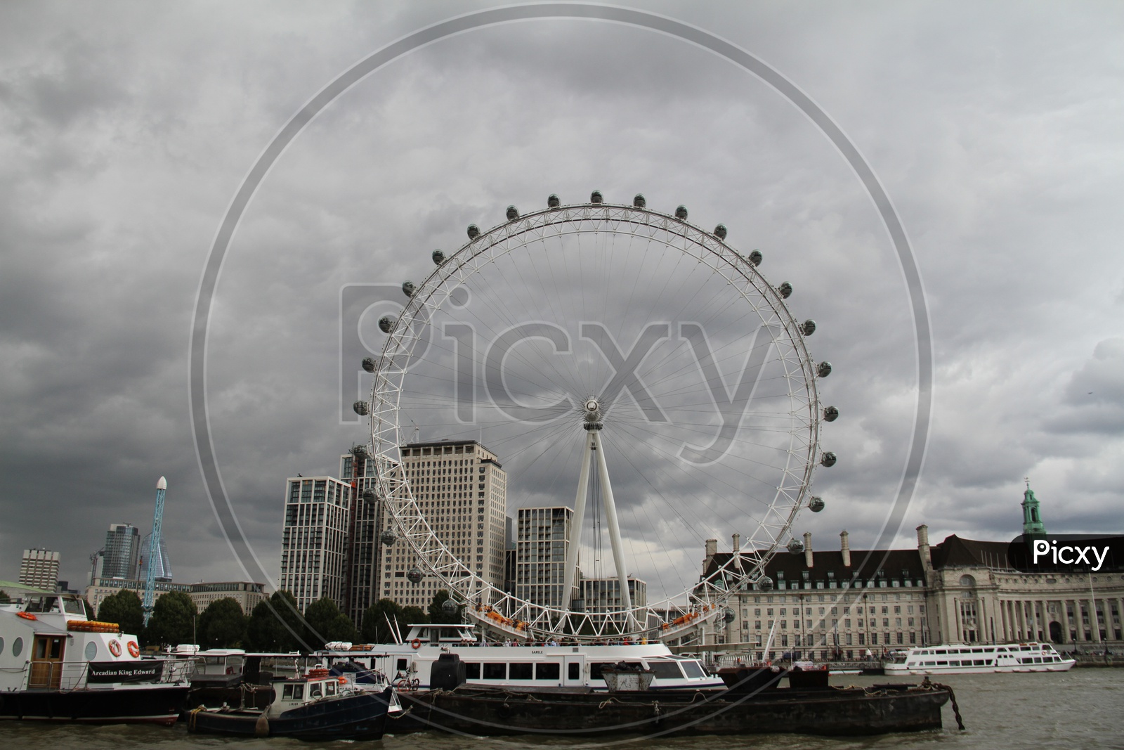 Rainy Clouds over London Eye or Large Ferris Wheel