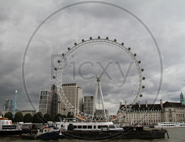 Rainy Clouds over London Eye or Large Ferris Wheel