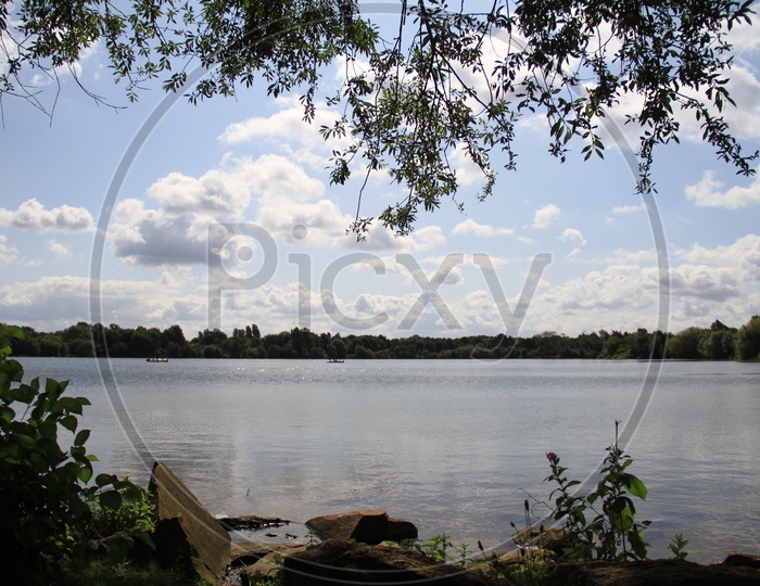 A Lake View with Clouds in Sky