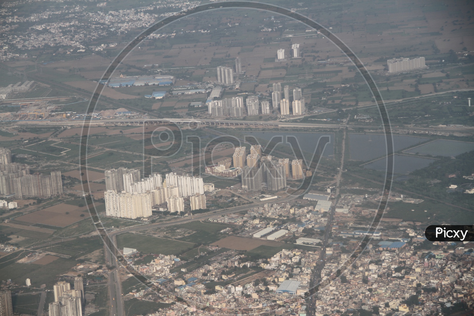 Aerial View Of Noida With  Buildings From Flight Window
