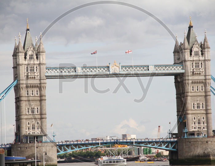 Tower Bridge in London with United Kingdom Flags