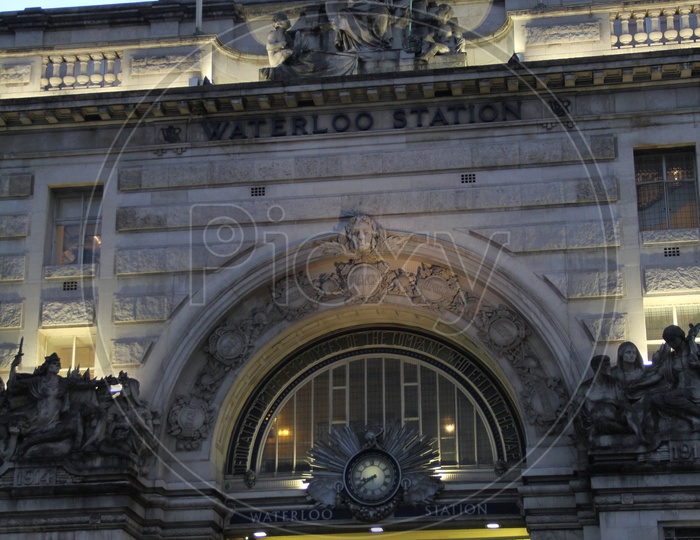 People walking into London Waterloo Railway Station