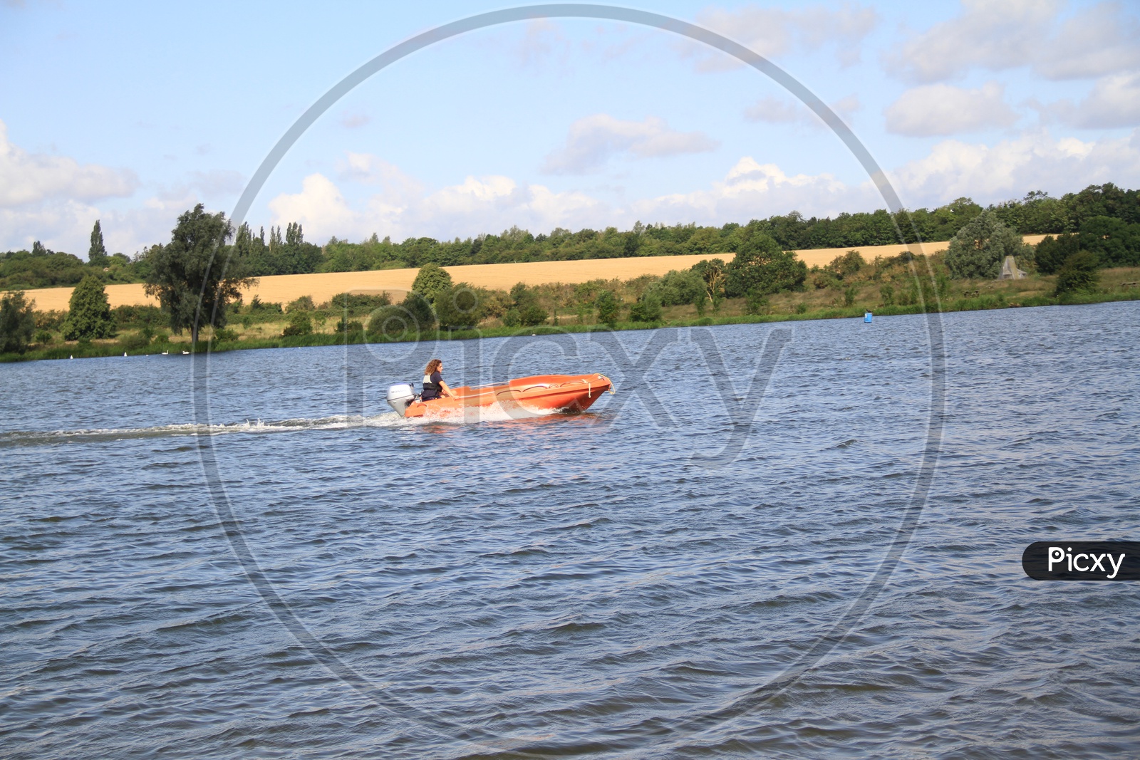 Boating in a Lake at Ferry Meadows Caravan and Motorhome Club Site