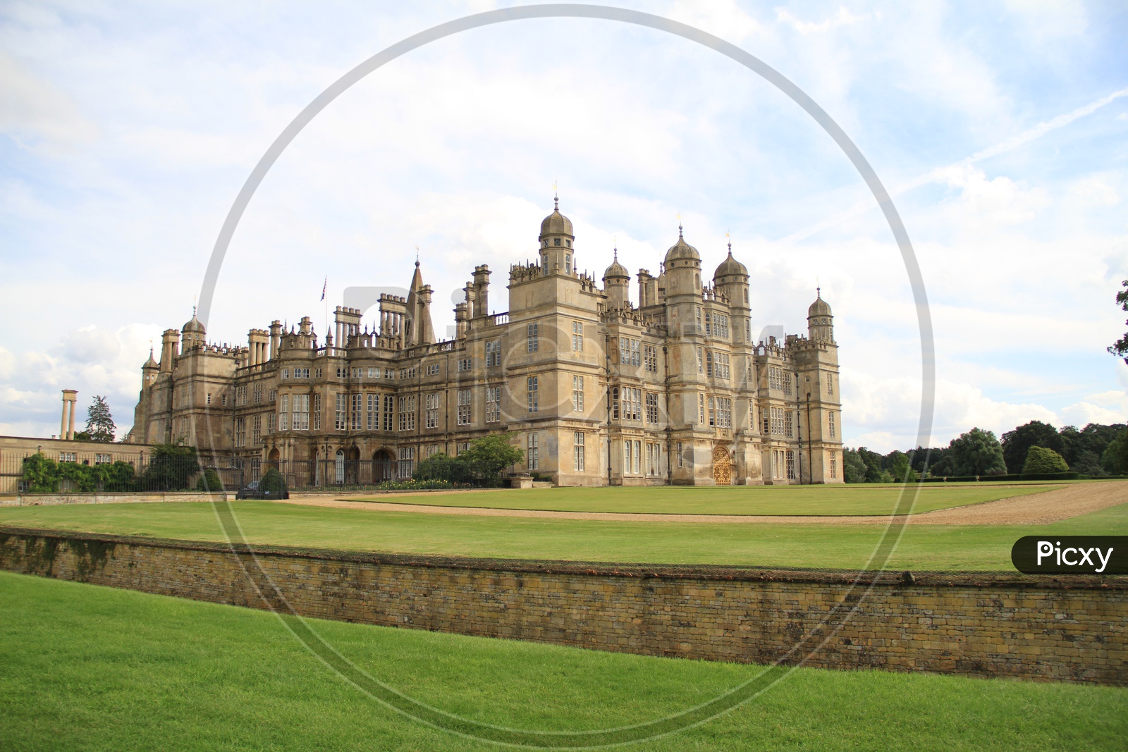 Burghley House with Clouds in Sky