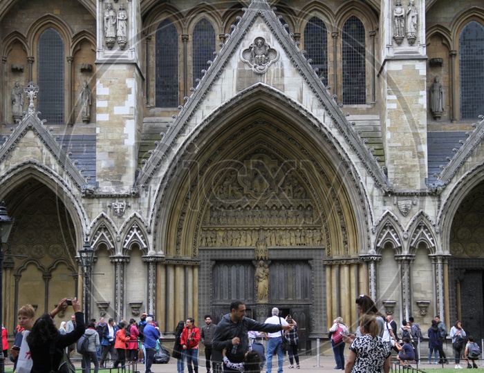 Tourists Taking Pictures of Westminster Abbey Cathedral or Church