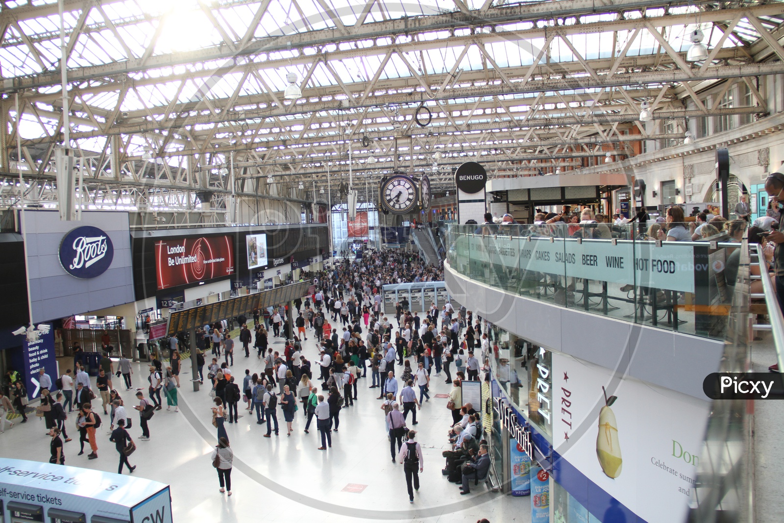 Interiors of Waterloo Railway Station with People walking