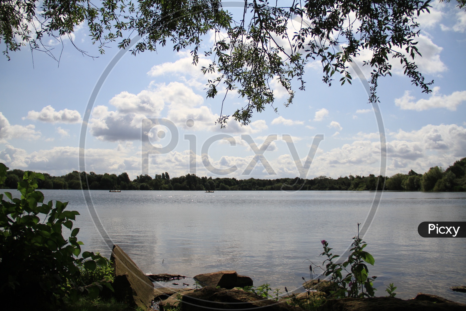 A Lake View with Clouds in Sky