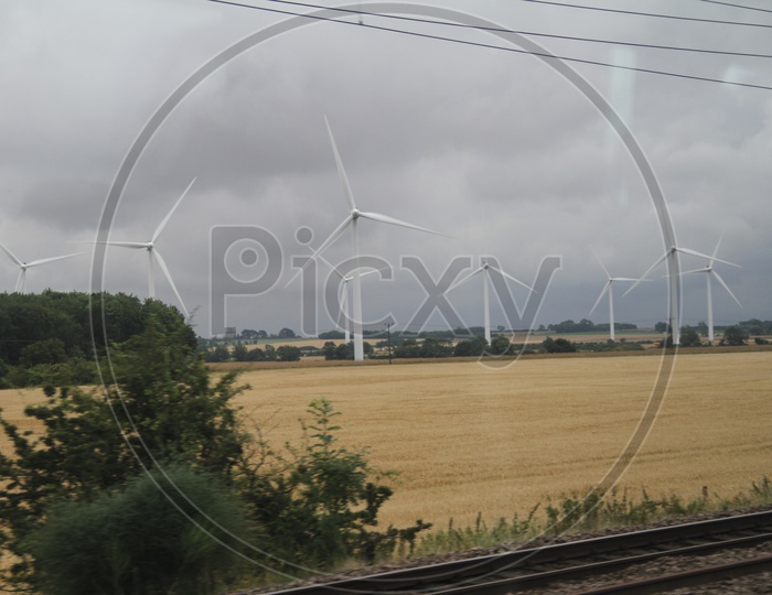 Wind Turbines near Railway Tracks