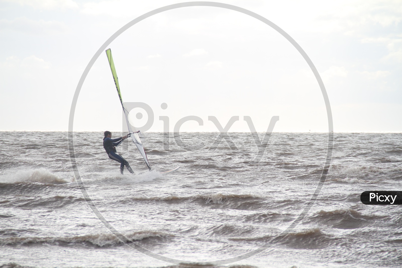Male having fun with Kite Surfing on Beach, Adventure Beach Sports
